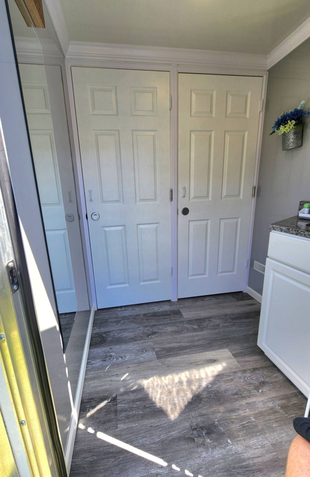 Hallway inside restroom trailer