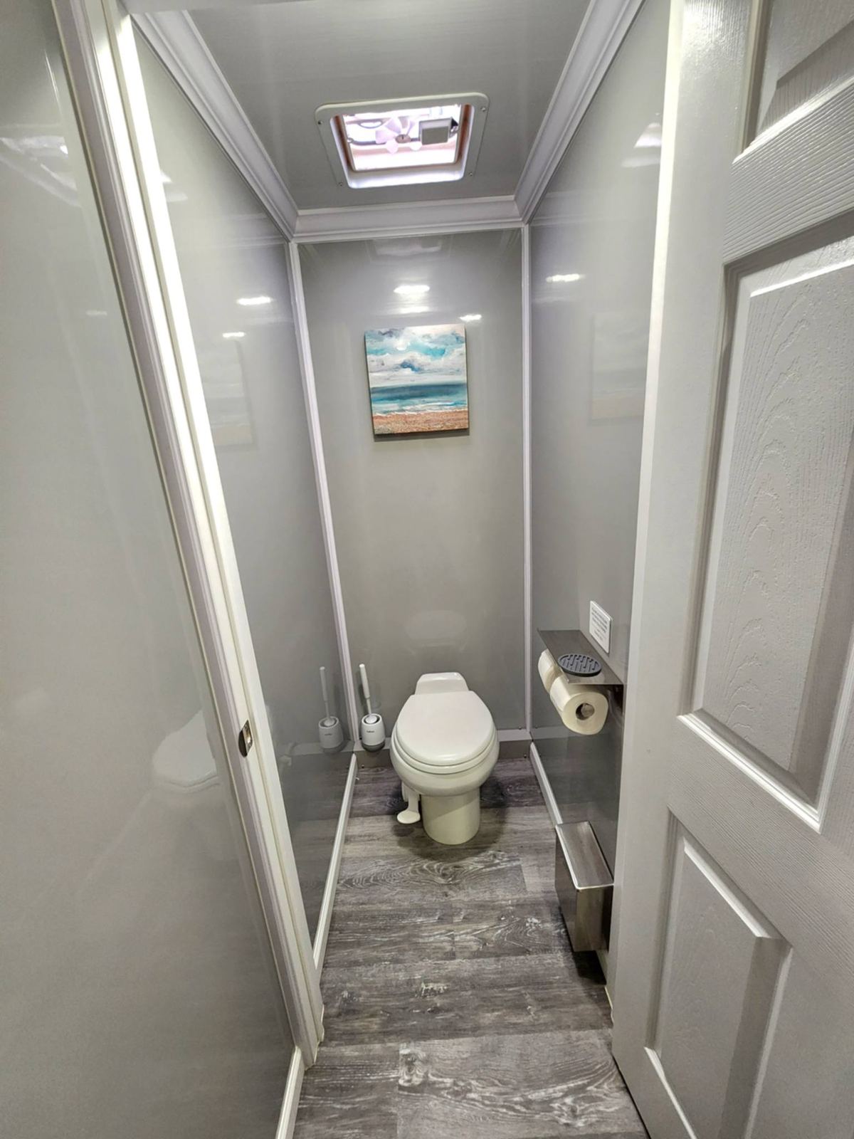 Restroom stall with abstract artwork
